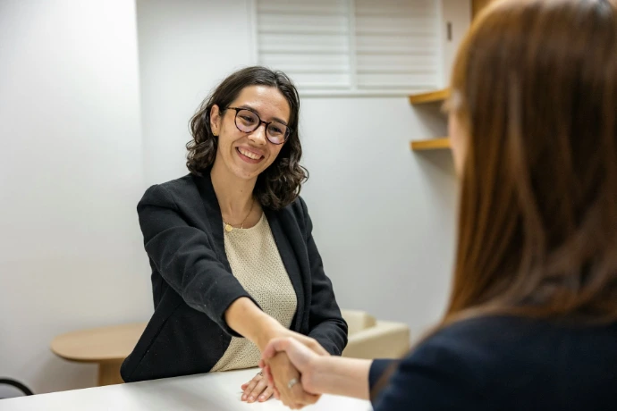 Candidate shaking hands at a job interview
