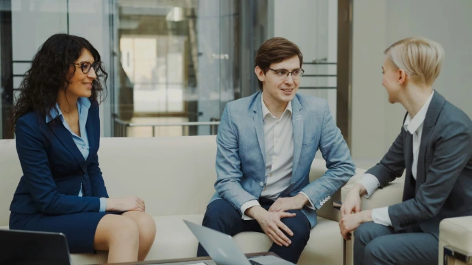 Finance professionals in a client meeting